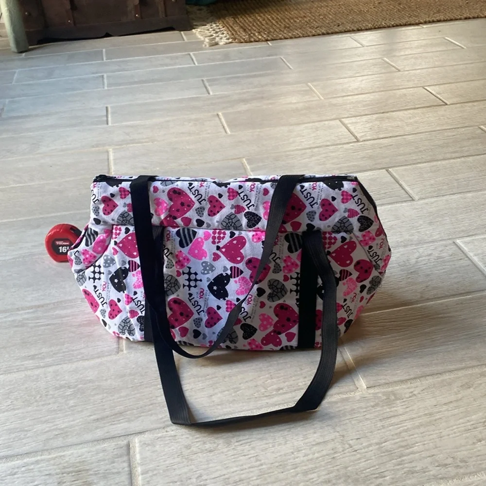 Pet Carrier.10.5”tall x 20”wide x 9”Deep. Long straps. Removable bottom. Zipper